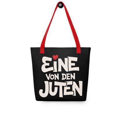 Schwarzer All-Over Stoffbeutel mit Eine von den Juten Print, mit rotem Henkel