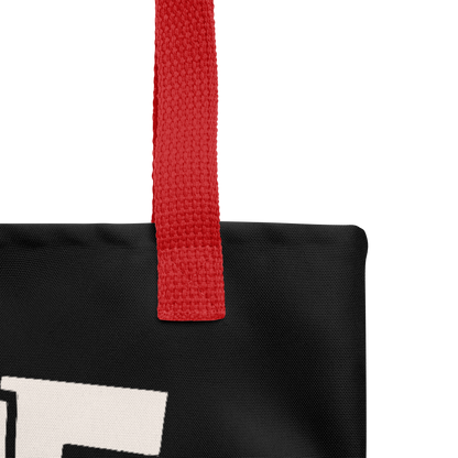 Schwarzer All-Over Stoffbeutel mit Eine von den Juten Print, mit rotem Henkel, Nahaufnahme