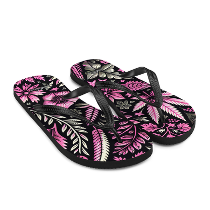 Seitenansicht zwei Flip-Flops mit schwarz pinkem Hanfblatt Muster