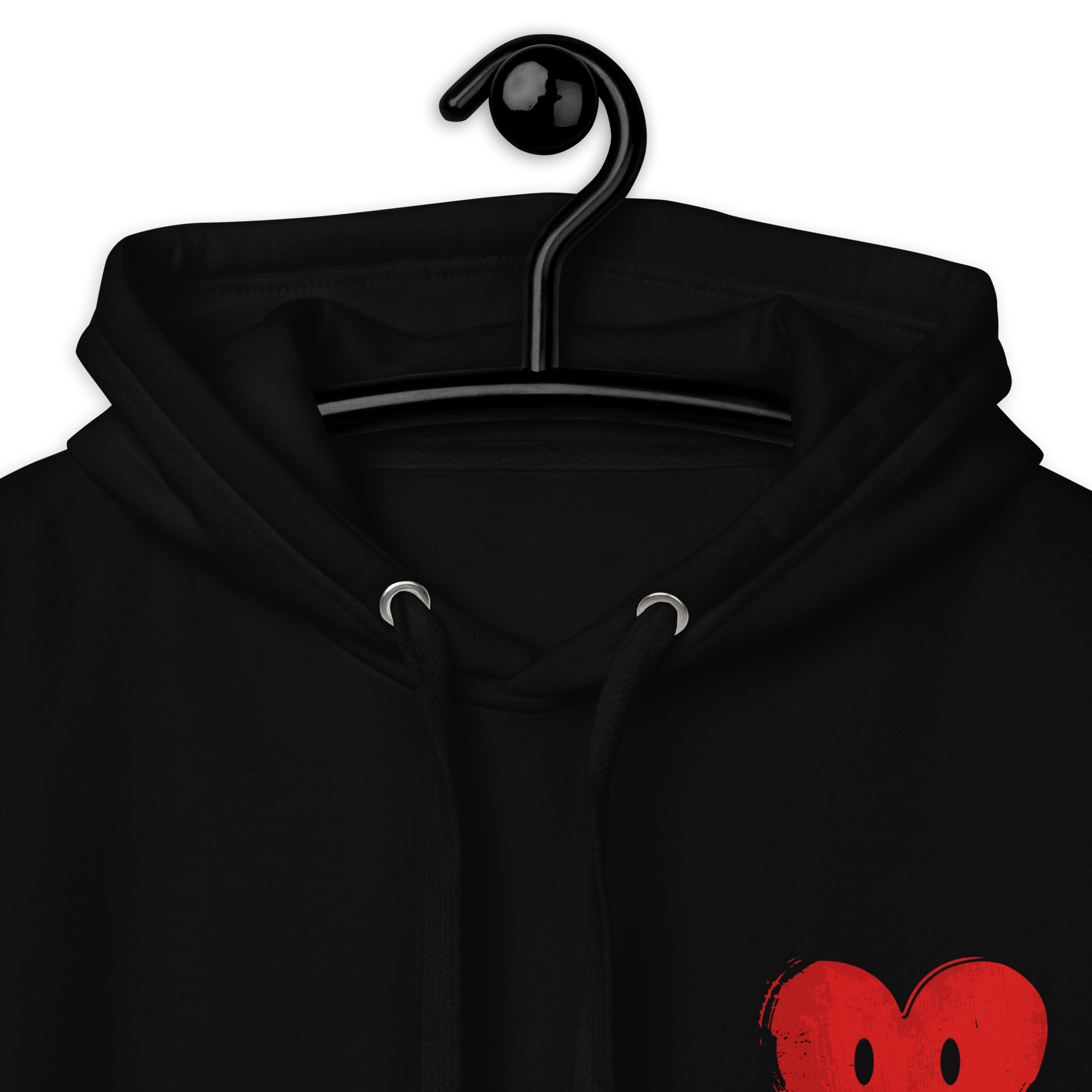 Nahaufnahme Schwarzer Pulli mit kleinem lachendem roten Herz Print