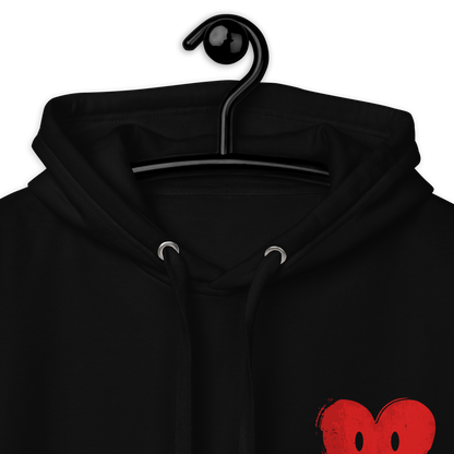 Nahaufnahme Schwarzer Pulli mit kleinem lachendem roten Herz Print