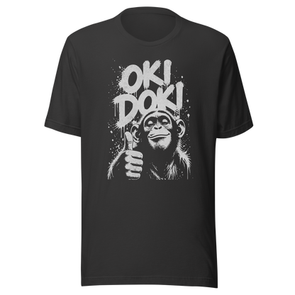Graues T-Shirt mit Affen der Daumen hoch zeigt und den Worten Oki Doki im Graffiti Style