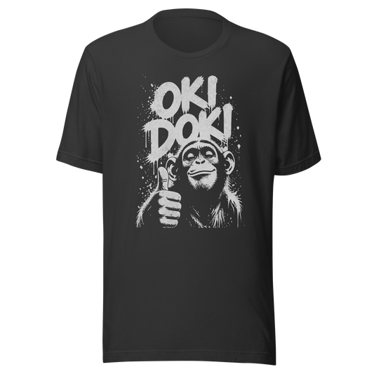 Graues T-Shirt mit Affen der Daumen hoch zeigt und den Worten Oki Doki im Graffiti Style