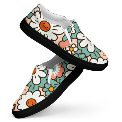 Slip Ons mit buntem Blumenmuster und schwarzem Gummirand Seitanansicht