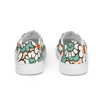 Slip Ons mit buntem Blumenmuster und weißem Gummirand Hintenansicht