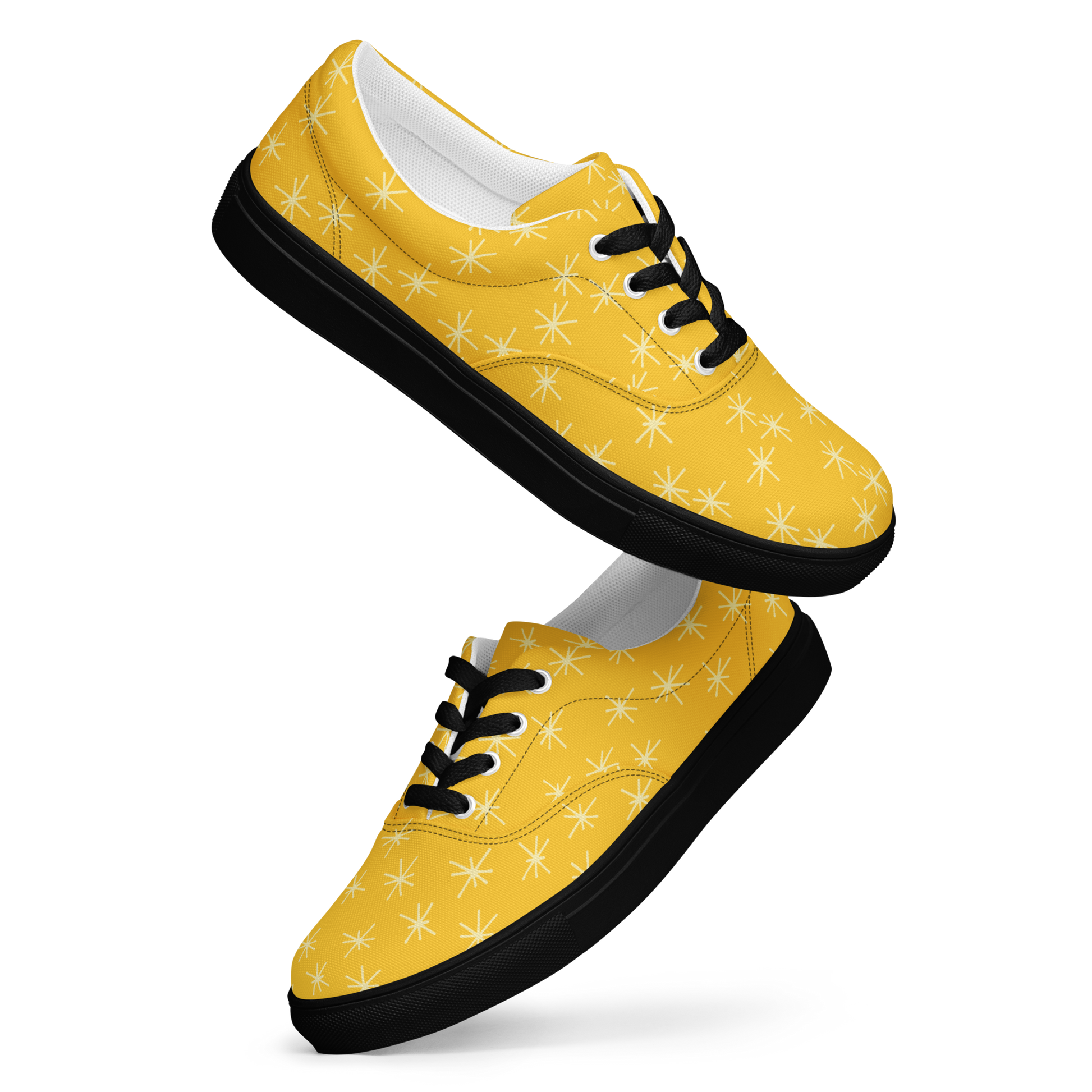 Gelbe Damen Sneaker mit weißem Sternen Muster und schwarzem Rand