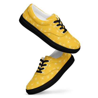 Gelbe Damen Sneaker mit weißem Sternen Muster und schwarzem Rand