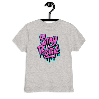Graues Kinder T-Shirt mit pinkem"Stay positive" Graffiti