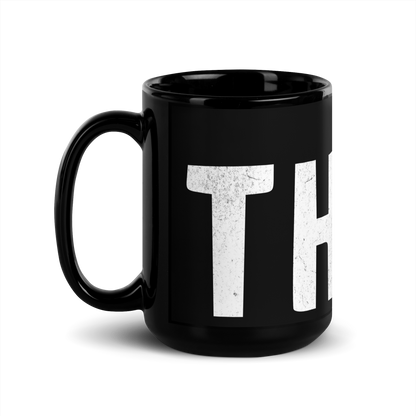 Schwarze Tasse mit THINK Aufdruck mit ausgeschnittenem N, Seitenansicht Links