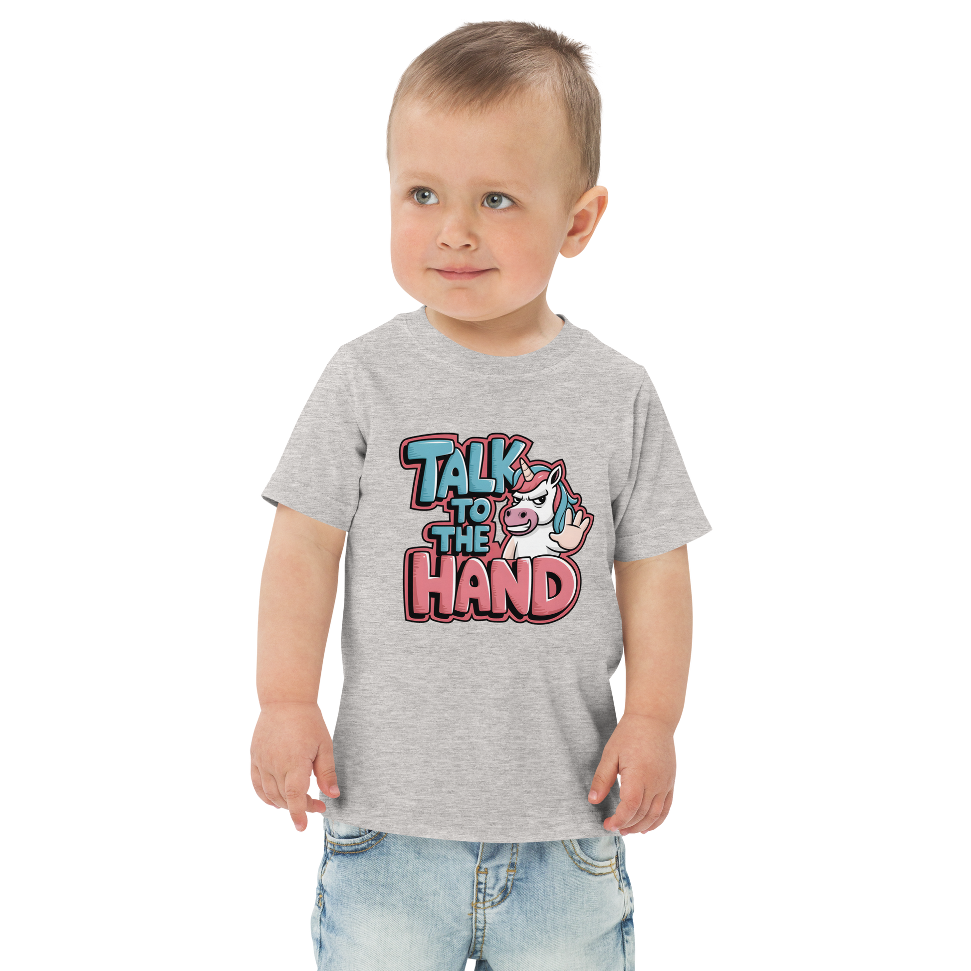 Junge trägt graues T-Shirt mit Talk to the Hand Schriftzug und Einhorn das Hand zeigt