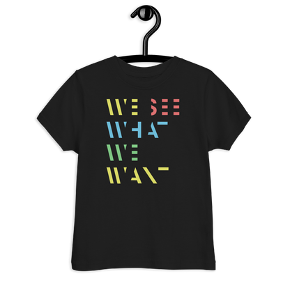 Schwarzes Kinder T-Shirt mit buntem We See What We Want Schriftzug