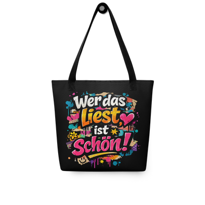 Schwarzer All Over Stoffbeutel mit buntem Wer das liest ist schön Print im Streetart Style und schwarzem Henkel