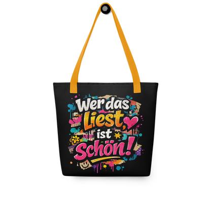 Schwarzer All Over Stoffbeutel mit buntem Wer das liest ist schön Print im Streetart Style und gelbem Henkel