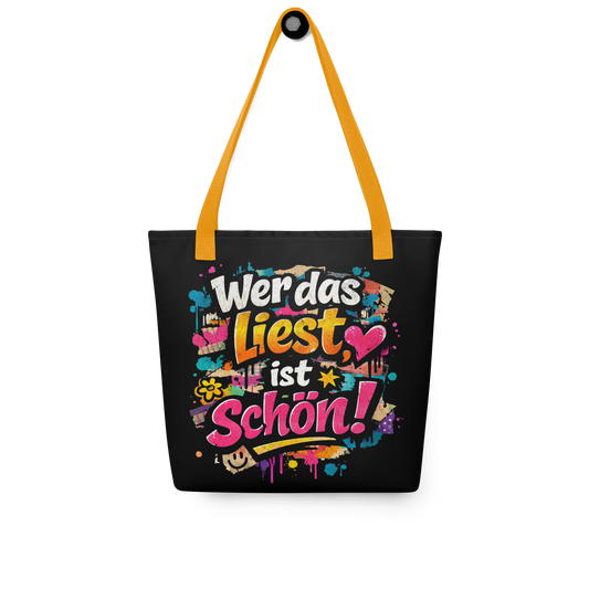 Schwarzer All Over Stoffbeutel mit buntem Wer das liest ist schön Print im Streetart Style und gelbem Henkel