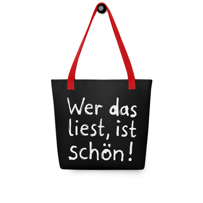 Schwarzer All-Over Stoffbeutel mit kindlichem Wer das liest, ist schön! Print und roten Henkeln
