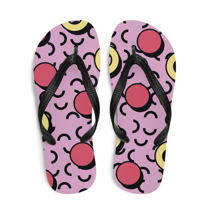 Obenansicht von zwei Flip-Flops in rosa mit roten und gelben Formen